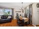 Inviting dining area with a decorative light fixture at 1240 Hamilton Dr, Noblesville, IN 46060