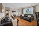 Comfortable living room with wood floors, and ample natural light at 1240 Hamilton Dr, Noblesville, IN 46060
