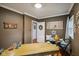 Cozy office with hardwood floors, wooden desk, and decorative art at 1240 Hamilton Dr, Noblesville, IN 46060