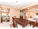 Open-concept dining room seamlessly integrates with the living room and kitchen spaces at 12994 Dekoven Dr, Fishers, IN 46037