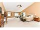 Expansive main bedroom with a vaulted ceiling, sitting area and exercise equipment at 12994 Dekoven Dr, Fishers, IN 46037