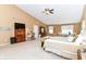 Open main bedroom with a vaulted ceiling, ample lighting, and furnishings at 12994 Dekoven Dr, Fishers, IN 46037