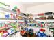 Organized walk-in pantry with wire shelving, showcasing ample storage for food and household items at 12994 Dekoven Dr, Fishers, IN 46037
