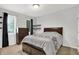 Cozy bedroom with carpet, dresser, and two windows with nice natural light at 14492 Allison Dr, Carmel, IN 46033