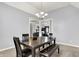 Bright dining room with a dining set, chandelier, and light-colored walls, perfect for Gathering meals and gatherings at 14492 Allison Dr, Carmel, IN 46033