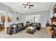 Open concept living room with hardwood floors and large windows, great for entertaining and relaxation at 14492 Allison Dr, Carmel, IN 46033