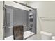 This cozy shower and tub features sleek tile work, modern fixtures, and ample space at 14492 Allison Dr, Carmel, IN 46033
