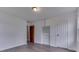 Bright bedroom with hardwood floors and closet at 1601 Southern Ave, Beech Grove, IN 46107
