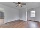 Bedroom with hardwood floors, ceiling fan and natural light at 1601 Southern Ave, Beech Grove, IN 46107