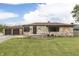 Charming stone home with a two-car garage and a well-maintained lawn in a residential neighborhood at 1601 Southern Ave, Beech Grove, IN 46107