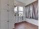 Functional laundry room with ample storage, built-in cabinets, and natural light at 1601 Southern Ave, Beech Grove, IN 46107