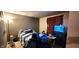 Simple bedroom featuring a bed, TV on a stand, and basic furnishings at 1619 Crest Ct, Indianapolis, IN 46214