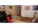 Room with a desk, computer, rug, and decorated walls with a doorway at 1619 Crest Ct, Indianapolis, IN 46214