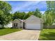 Charming exterior with brick accents, lush lawn, and attached two-car garage at 167 Hilltop Farms Blvd, New Whiteland, IN 46184