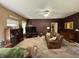 Cozy living room with plush carpet and natural light, ready for comfortable living at 167 Hilltop Farms Blvd, New Whiteland, IN 46184
