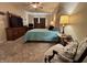 Comfortable main bedroom with a ceiling fan, large bed, and relaxing ambiance at 167 Hilltop Farms Blvd, New Whiteland, IN 46184