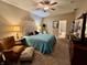 Inviting main bedroom with neutral tones, ceiling fan, with an ensuite bathroom at 167 Hilltop Farms Blvd, New Whiteland, IN 46184