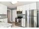 Updated kitchen with stainless steel appliances and granite counters at 1841 New St, Indianapolis, IN 46203