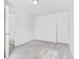 Neutral bedroom with carpet, white trim, and an open closet at 1936 Southernwood Ln, Indianapolis, IN 46231