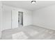 Spacious carpeted bedroom with a closet and neutral paint at 1936 Southernwood Ln, Indianapolis, IN 46231