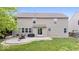 Spacious backyard featuring a patio area, seating, grill, and a well-maintained lawn at 19534 Forsythe Dr, Noblesville, IN 46060