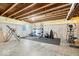 Spacious basement transformed into a home gym with various exercise equipment at 19534 Forsythe Dr, Noblesville, IN 46060