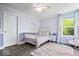 Delightful Bedroom featuring a crib, a pastel color scheme, and cloud rug at 19534 Forsythe Dr, Noblesville, IN 46060