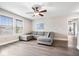 Inviting bonus room featuring a grey sectional sofa and ample natural light at 19534 Forsythe Dr, Noblesville, IN 46060