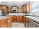 This is a kitchen with stainless steel appliances and wood cabinets at 19534 Forsythe Dr, Noblesville, IN 46060