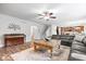 Open-concept living room featuring hardwood floors, neutral tones, and comfortable furniture at 19534 Forsythe Dr, Noblesville, IN 46060