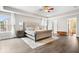 Spacious main bedroom with a tray ceiling, and a decorative accent rug at 19534 Forsythe Dr, Noblesville, IN 46060