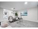 Basement with comfortable couch, stylish side tables and decor at 2105 Mayfair Dr, Indianapolis, IN 46260
