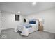 Cozy bedroom with carpet, a comfortable bed, and soothing blue accents at 2105 Mayfair Dr, Indianapolis, IN 46260