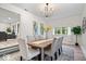 Inviting dining room with stylish chairs, modern chandelier, and an open layout at 2105 Mayfair Dr, Indianapolis, IN 46260