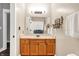Bathroom with custom cabinet and modern mirror and lighting at 241 Liberty Blvd, Mooresville, IN 46158