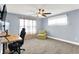 Bedroom with a ceiling fan, an entertainment area, a chair, and lots of natural light at 241 Liberty Blvd, Mooresville, IN 46158