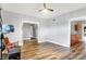 Spacious living room with hardwood floors and open doorways to other rooms at 241 Liberty Blvd, Mooresville, IN 46158