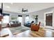 Cozy living room with comfortable seating, natural light, and wood-style flooring at 241 Liberty Blvd, Mooresville, IN 46158