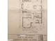 First floor plan featuring a living room, dining room, and parlor area of the residence at 2445 N Delaware St, Indianapolis, IN 46205
