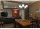 Inviting living room features a dining table, plush seating, and a cozy atmosphere for relaxing and entertaining at 2445 N Delaware St, Indianapolis, IN 46205