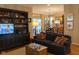 Cozy living room with a built-in bookcase and plush sofa at 2445 N Delaware St, Indianapolis, IN 46205