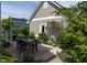 Landscaped patio with dining table and seating, great for outdoor entertaining at 2445 N Delaware St, Indianapolis, IN 46205