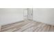 Bedroom featuring light wood-look flooring and white walls at 301 Leeds Ave, Indianapolis, IN 46201