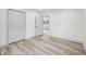 This bedroom features wood floors, a large closet and neutral paint at 301 Leeds Ave, Indianapolis, IN 46201