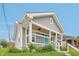 Gray home with inviting porch and updated features at 301 Leeds Ave, Indianapolis, IN 46201