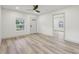 Bright living room with modern flooring, fresh paint, and ample natural light at 301 Leeds Ave, Indianapolis, IN 46201