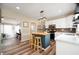 Modern kitchen with stainless steel appliances, center island with seating, and ample cabinetry at 3360 Main St, Plainfield, IN 46168