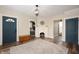 Bright living room with hardwood floors, a decorative fireplace, and neutral paint at 3360 Main St, Plainfield, IN 46168