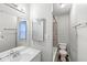Clean bathroom features a vanity, a toilet and a combined shower and bathtub at 3409 S Rural St, Indianapolis, IN 46237