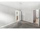 Bright bedroom with neutral-toned walls, carpeted flooring, and natural light at 3409 S Rural St, Indianapolis, IN 46237